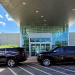 Black SUVs parked outside Signature Flight Support