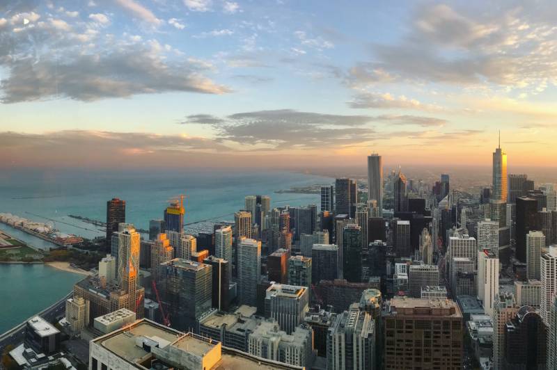 Aerial sunset view of downtown skyline and lake
